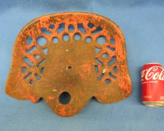 Lot 257. Cast iron tractor seat