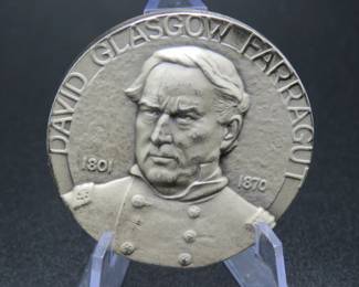 Lot 341. Medallion weighing 2.268 troy ounces of .999 pure silver from The Hall of Fame for Great Americans Series featuring David Glasgow Farragut. Made by the New York Medallic Art Co.
