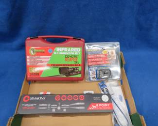Lot 183. Simmons 6-18 x 50mm scope, Predator Tactics Infrared Illuminator Kit, and some gun locks