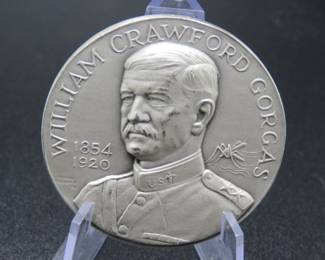 Lot 343. Medallion weighing 1.997 troy ounces of .999 pure silver from The Hall of Fame for Great Americans Series featuring William Crawford Gorgas. Made by the New York Medallic Art Co.