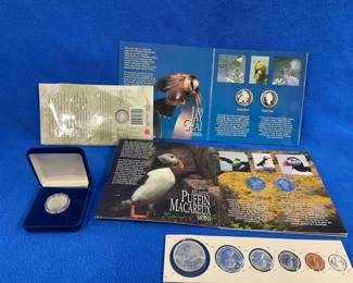 Lot 158. Silver Canadian coins: Canada on the Wing, four sterling silver proof 50 cent coins. 1992 proof sterling 25-cent coin weighing around .17 ounces. 2000 ten-cent sterling coin weighing 2.4g. 1964 type set with about 1.11 ounces of pure silver.
