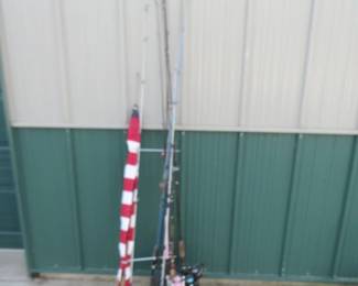 Lot 432. Fishing rods and an American flag