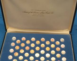 Lot 376. 1969 sterling silver Franklin Mint States of the Union mini-coin set with 50 coins weighing approx. 36 to 42 grams