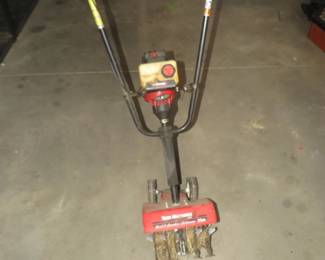 Lot 241. 31cc Yard Machines two stroke tiller / cultivator, has compression