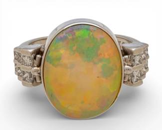 Lot 75
14k White Gold, Opal, and Diamond Ring Size 7