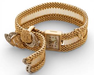 Lot 13
Lura (Swiss) 14k Gold Bracelet Watch with Diamonds 1940