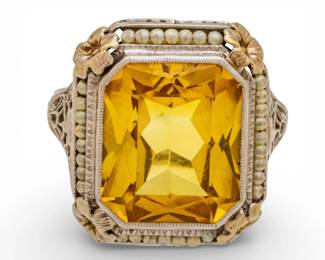 Lot 41
8 CT. Yellow Sapphire and 14 KT White Gold Ring