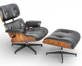 Lot 1046
Charles and Ray Eames for Herman Miller (American) Black Leather and Rosewood 670 Lounge Chair and 671 Ottoman