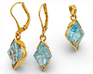 Lot 93
14k Yellow Gold and Topaz Pendant and Earring Set