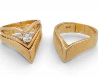 Lot 33
Three Chevron 14k Yellow Gold, One with Diamond, Stack Rings