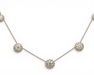 Lot 21
Italian Ladies 18k White Gold and Diamond Multiple Halo Necklace