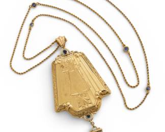 Lot 17
14K Gold Make up Pendant on 28" 14K Gold Chain