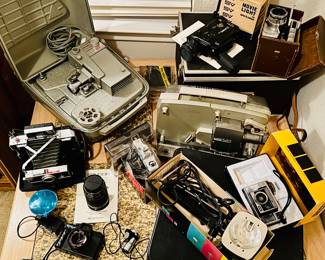 Movie & Photography Equipment: Bell & Howell Zoomatic, Elmo Super 8 Sound 23OS-XL, Guillotine Splicer, Tower 8mm projector, PhotoFlex MC-35, Polaroid Land Camera Automatic 100, Sylvania Sun Gun II, Kankon 50mm series, Minolta Pocket Pak 440E + more