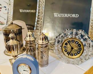 Waterford frame, Wedgewood clocks, silver salt shakers