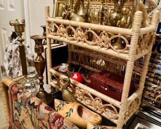 brass vases, brass candlestick holder, wooden shoes, wicker shelf
