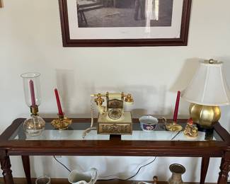 Collectibles, sofa table and fun old phone