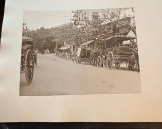 Antique Photograph of Rickshaws and HorseDrawn Carriages on a Street in Shanghai