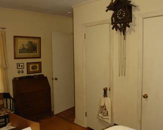 Black Forest German Cuckoo clock and antique slant top desk