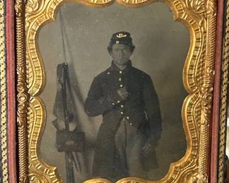 1/6 plate tintype of Union private photographed with his rifle and accouterments 