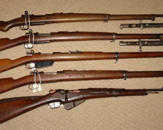 Tow Turkish Mauser with bayonets, 1891 Argentinian Mauser, 1896 Chilian Mauser, WWI French Carbine