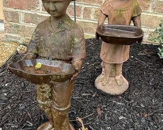 Vintage Cast Iron Boy and Girl Garden Statues Holding Bird Baths
