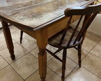Small antique table with Penny chairs