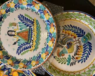 Dozens of Italian and Mexican pattern dishes and severing pieces