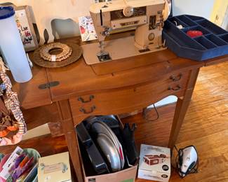 Vintage sewing machine with cabinet 