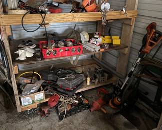 Nice work shelving on rollers and miscellaneous tools and parts
