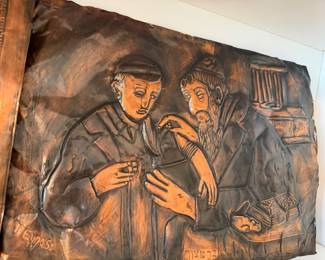 Vintage hand-hammered copper Judaica wall plaque depicting a rabbi teaching a young student