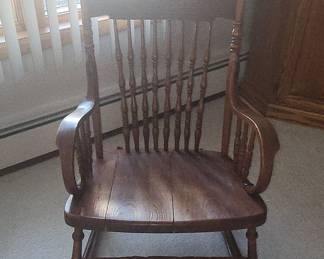 Antique Carved Oak Spindle Rocking Chair with Green Man Motif