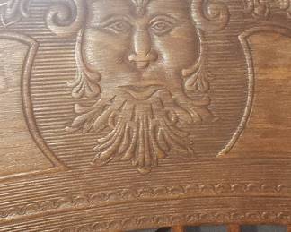 Antique Carved Oak Spindle Rocking Chair with Green Man Motif