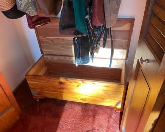 Cedar chest, purses, hats
