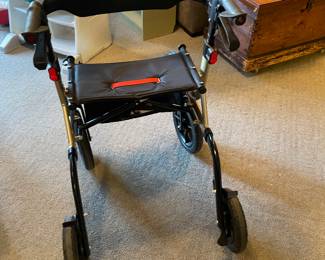 Walker with seat and brakes