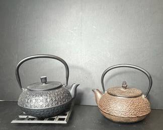 Pair of Cast Iron Teapots  Diamond and Textured Patterns