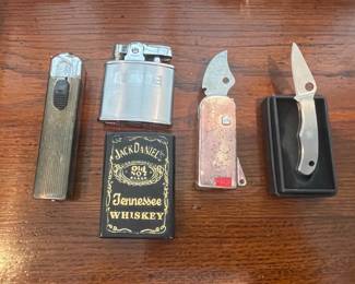 Assorted Lighters and Spyderco Pocket Knives