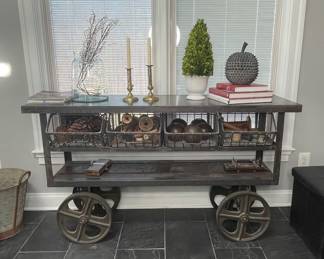Industrial Metal Console Table with Wire Baskets and Wheels