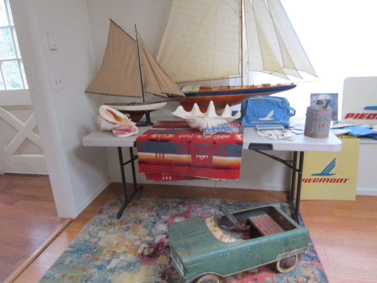 Vintage Pedal car, Giant clam shell, 2 ships, and some Piedmont airline
