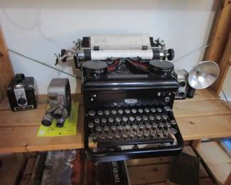 Another vintage typewriter and vintage cameras