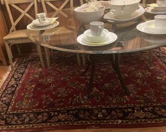 Iron leg glass top dining table