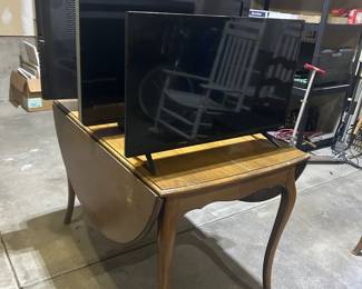 Several TV’s and drop leaf table 