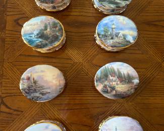 Several Thomas Kinkaid music boxes