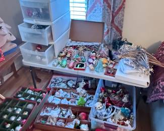 hundreds of Christmas decor items in the house and garage 