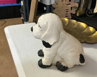 Cute little black and white doorstop dog
