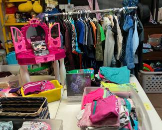 As you can see is very organized we have children’s suits Easter dresses. Costumes vintage Walt Disney characters.