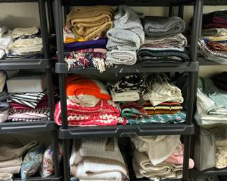 Nice selection of quilts, comforters, Afghans sheet sets