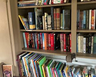 Paperback novels, DVDs children’s books