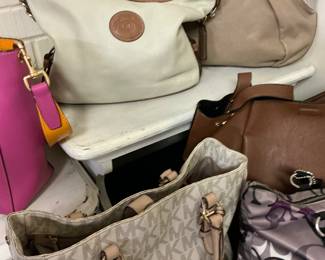 We have Michael Kors Dunn and Bourke, Brahma, Coach these purses go online for auction March 6 through the 12th bidding is online