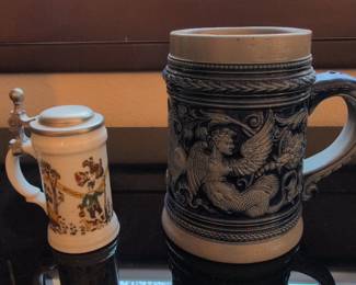 Repurposed Metal Art Tractor Sculpture and Assorted German Beer Steins