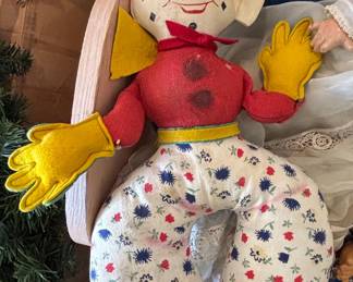 Vintage Composition and Cloth Dolls in Bassinet